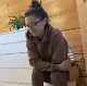 In what appears to be an Angie Joy produced clip, a girl wearing glasses takes a shit with clear plop sounds while sitting on a toilet and vaping. She may be a friend. Presented in 720P HD. About 4.5 minutes.